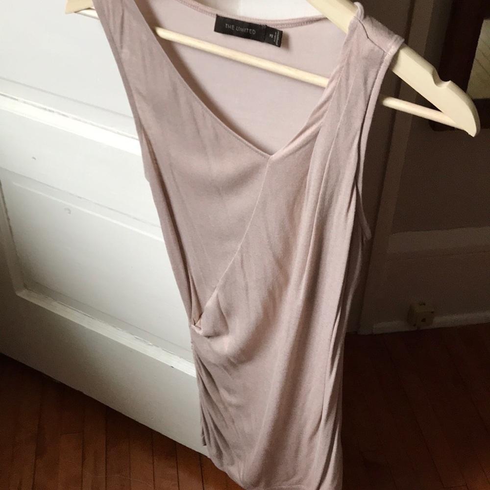 The limited pink shimmer faux wrap top